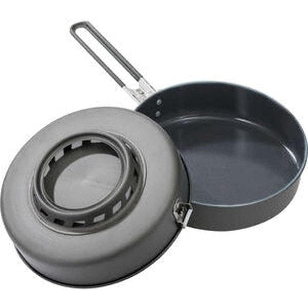 A top-down view of the MSR WindBurner Combo System with its lid open, showing the cooking pot and integrated burner base.