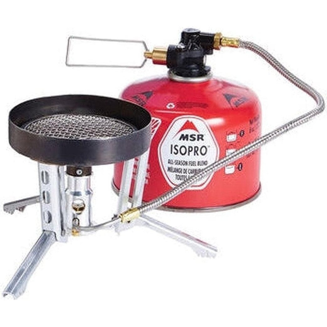 A top-down view of the MSR WindBurner Combo System with the red fuel canister and black cooking grate visible.