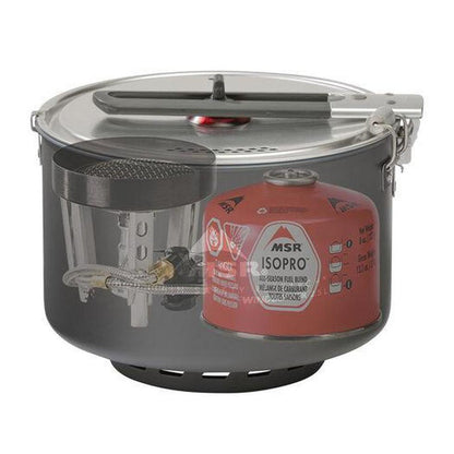A cutaway view of the MSR WindBurner Group Stove System showing the red fuel canister and internal components.