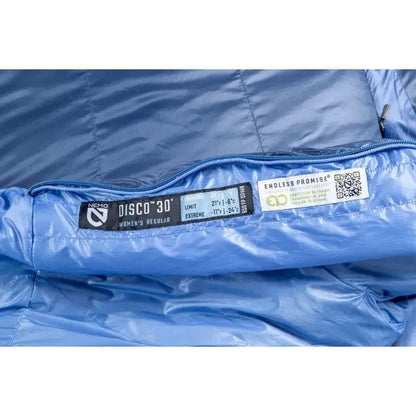 Close up of the NEMO Disco 30 Women's sleeping bag in Blue Horizon showing the zipper and labels.