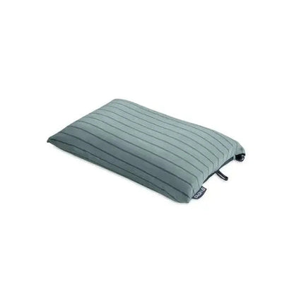 A side view of the NEMO Fillo Backpacking & Camping Pillow in Black Pearl against a white background.