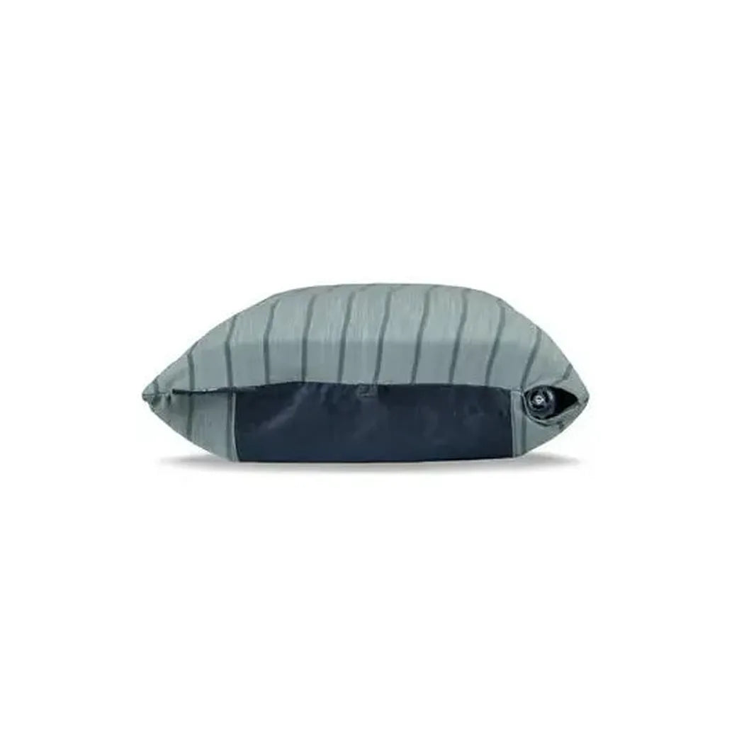 Side view of the NEMO Fillo Backpacking & Camping Pillow in Black Pearl showing the valve and dark panel against a white background.