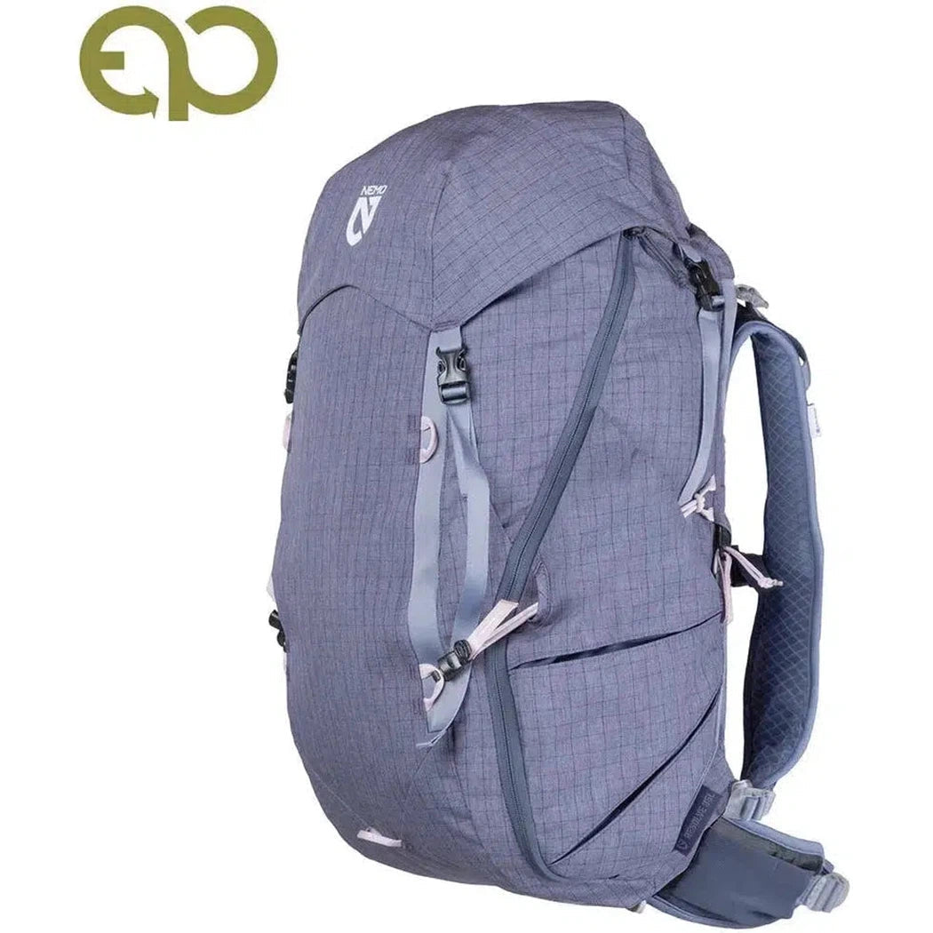 Side view of the NEMO Resolve Womens 35L Endless Promise backpack in Blue Granite showing the front straps and zippers against a white background.