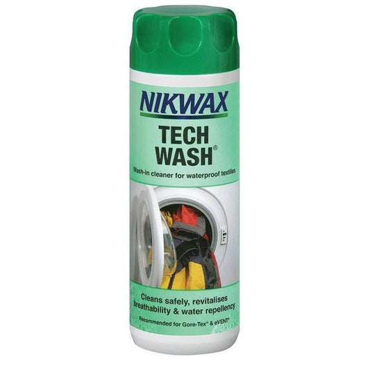 A front view of the green-capped Nikwax Tech Wash bottle showing a washing machine graphic on the label.