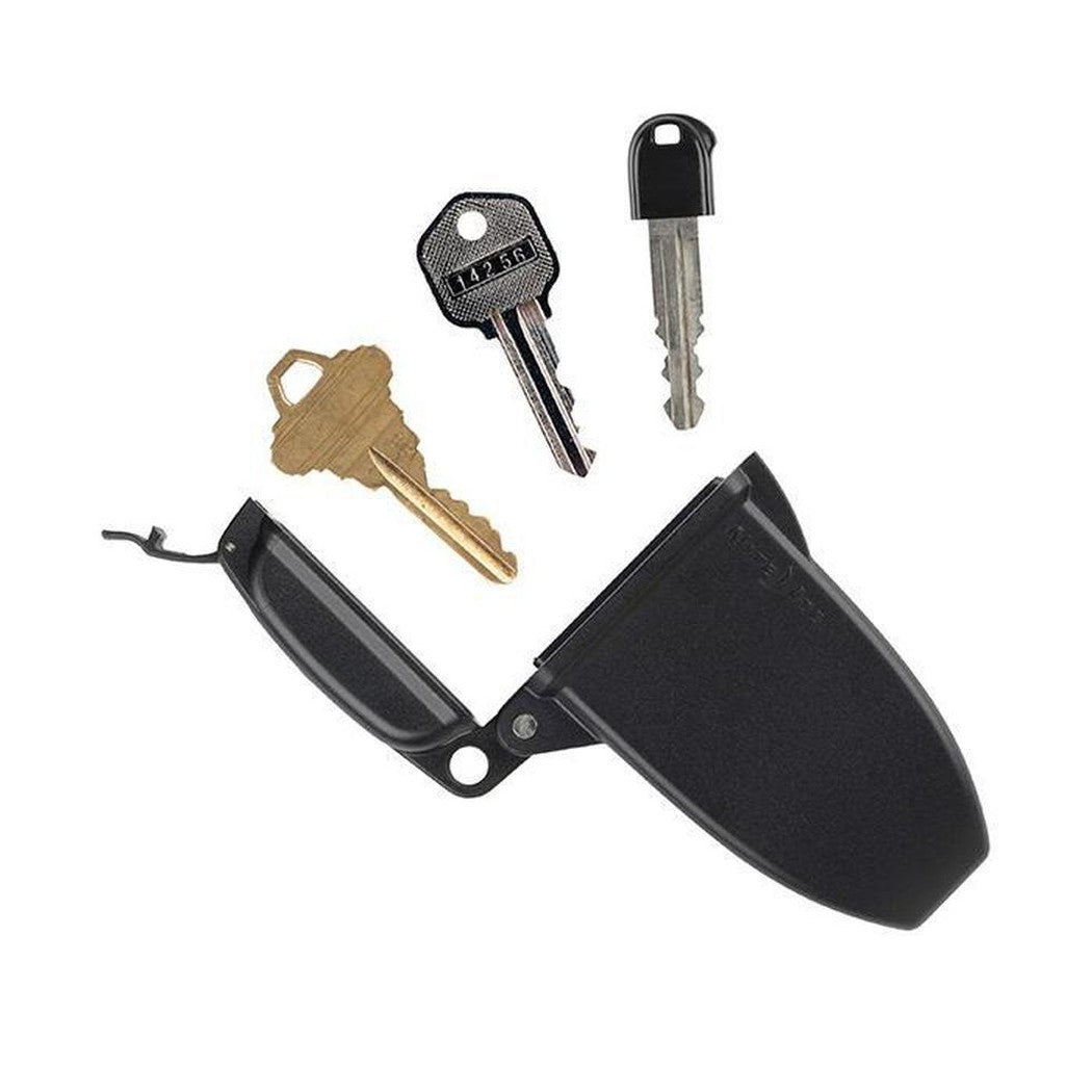 A top-down view of the Nite Ize HideOut Magnetic Key Box in Charcoal/Graphite holding three keys against a white background.