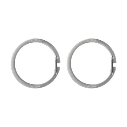 Two Nite Ize O-Series Gated Key Rings in a side view against a white background.