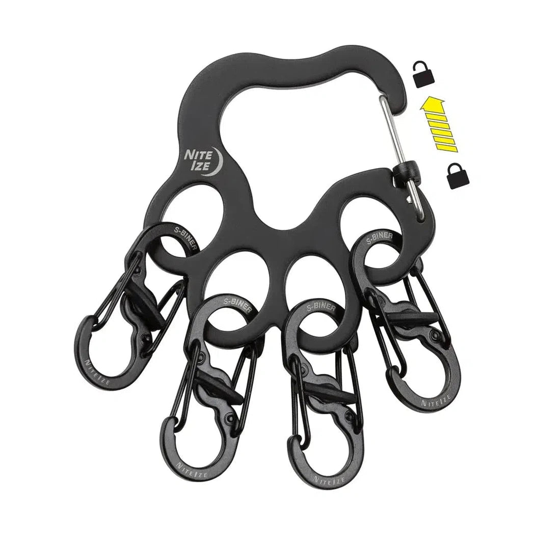 A black Nite Ize PawPrint Locker KeyRack with multiple carabiners, shown from a top-down angle against a white background.