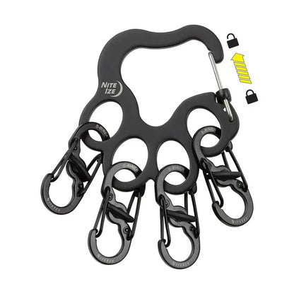 A black Nite Ize PawPrint Locker KeyRack with multiple carabiners, shown from a top-down angle against a white background.