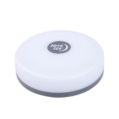 A top-down view of the Nite Ize Radiant StarLit Rechargeable Lantern and String Light DiscO with a white top and charcoal base.