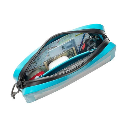 A top-down view of the Nite Ize RunOff Waterproof Hip Pack in Black, showing its waterproof zipper and contents like cash and keys inside.