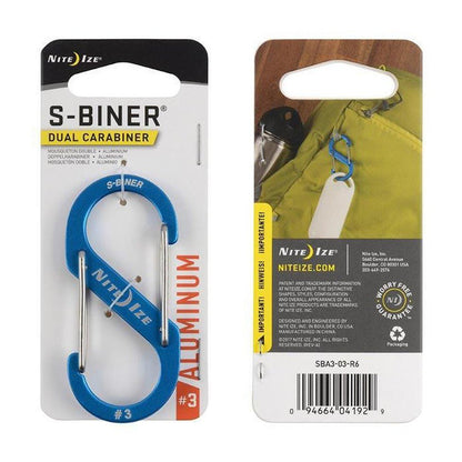 Front view of the Nite Ize S-Biner Aluminum Dual Carabiner #3 in blue on its packaging with a barcode and website.