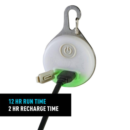 A close-up of the Nite Ize SpotLit Splash Waterproof Rechargeable Collar Light - Disc-O Select with a USB cable plugged in, showing the 12 hr run time and 2 hr recharge time text.