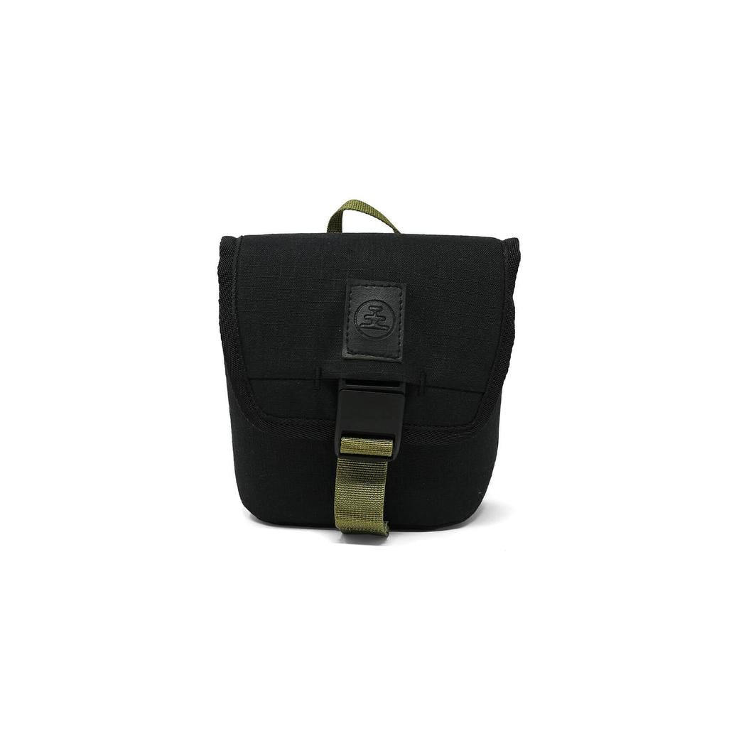 A front view of the Nocs Provisions Field Issue 32 Pouch in Charcoal showing the buckle closure and green strap against a white background.