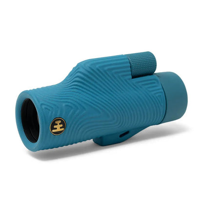A side view of the Nocs Provisions Field Tube Monocular Telescope in Banana Slug with a textured grip and a logo on the barrel against a white background.