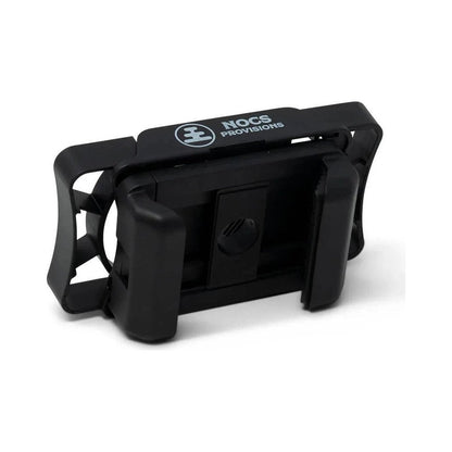 Black Nocs Provisions Photo Rig smartphone adapter with a clip and logo on top, shown from the back against a white background.