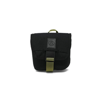 A front view of the Nocs Provisions Standard Issue Pouch in Charcoal with a green buckle and handle against a white background.