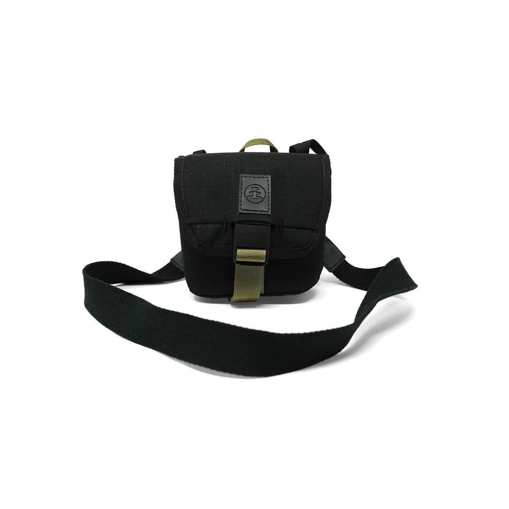 A black Nocs Provisions Standard Issue Pouch with a shoulder strap and buckle, photographed against a white background.