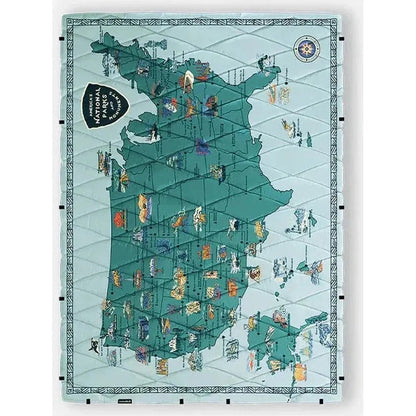 A flat lay of the Nomadix Puffer Blanket in National Parks and Monuments Map color showing the map design and border details.