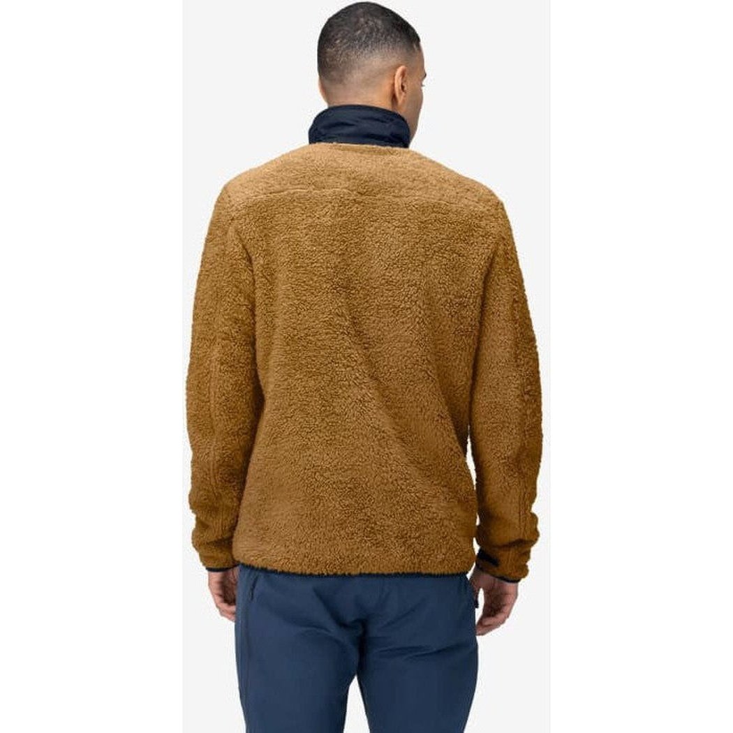 Back view of the Norrona Men's Femund Warm3 Jacket in Camelflage on a model wearing dark blue pants against a white background.