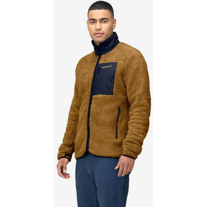 A front view of the Norrona Men's Femund Warm3 Jacket in Camelflage showing the chest pocket and model wearing it against a white background.