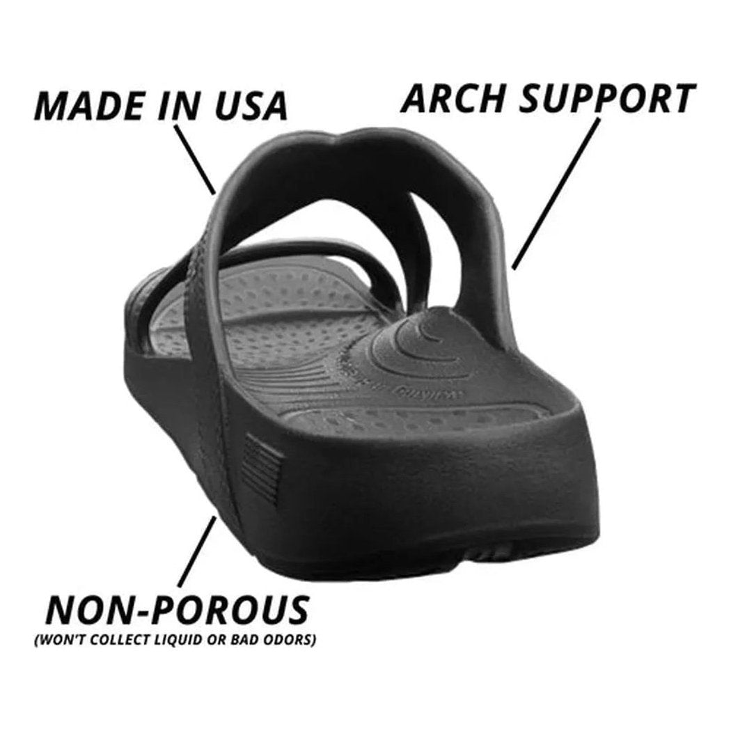 A side view of the NuuSol Women's Hailey Slide in Blue Horizon showing the arch support and non-porous sole against a white background.