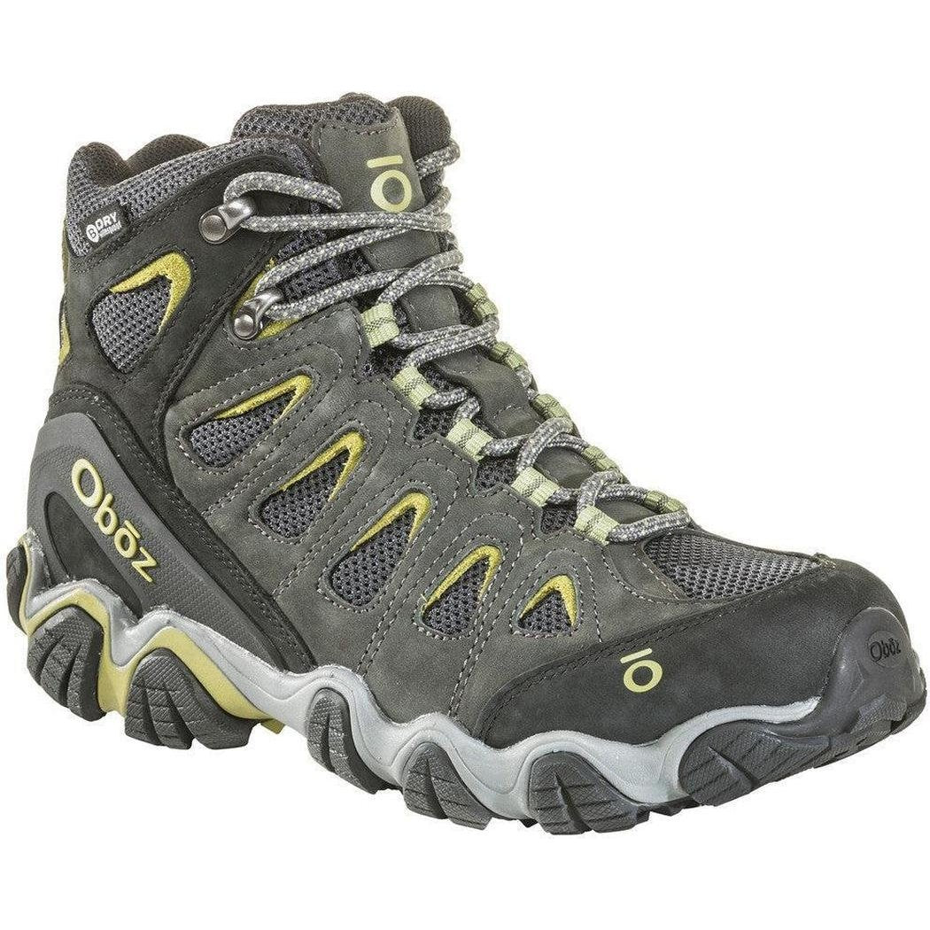 A side view of the Oboz Men's Sawtooth II Mid B-Dry boot in Dark Shadow/Woodbine Green with a white background.