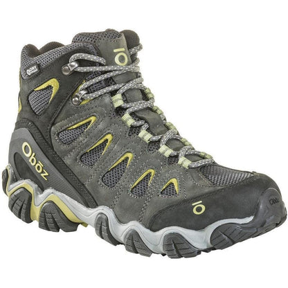 A side view of the Oboz Men's Sawtooth II Mid B-Dry boot in Dark Shadow/Woodbine Green with a white background.