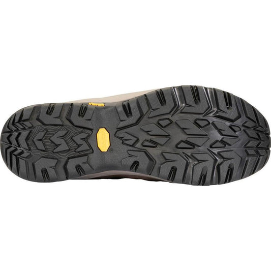 The sole of the Oboz Sawtooth Ascent Mid B-DRY boot in Charcoal is shown from below, with a yellow accent and rugged tread pattern against a white background.