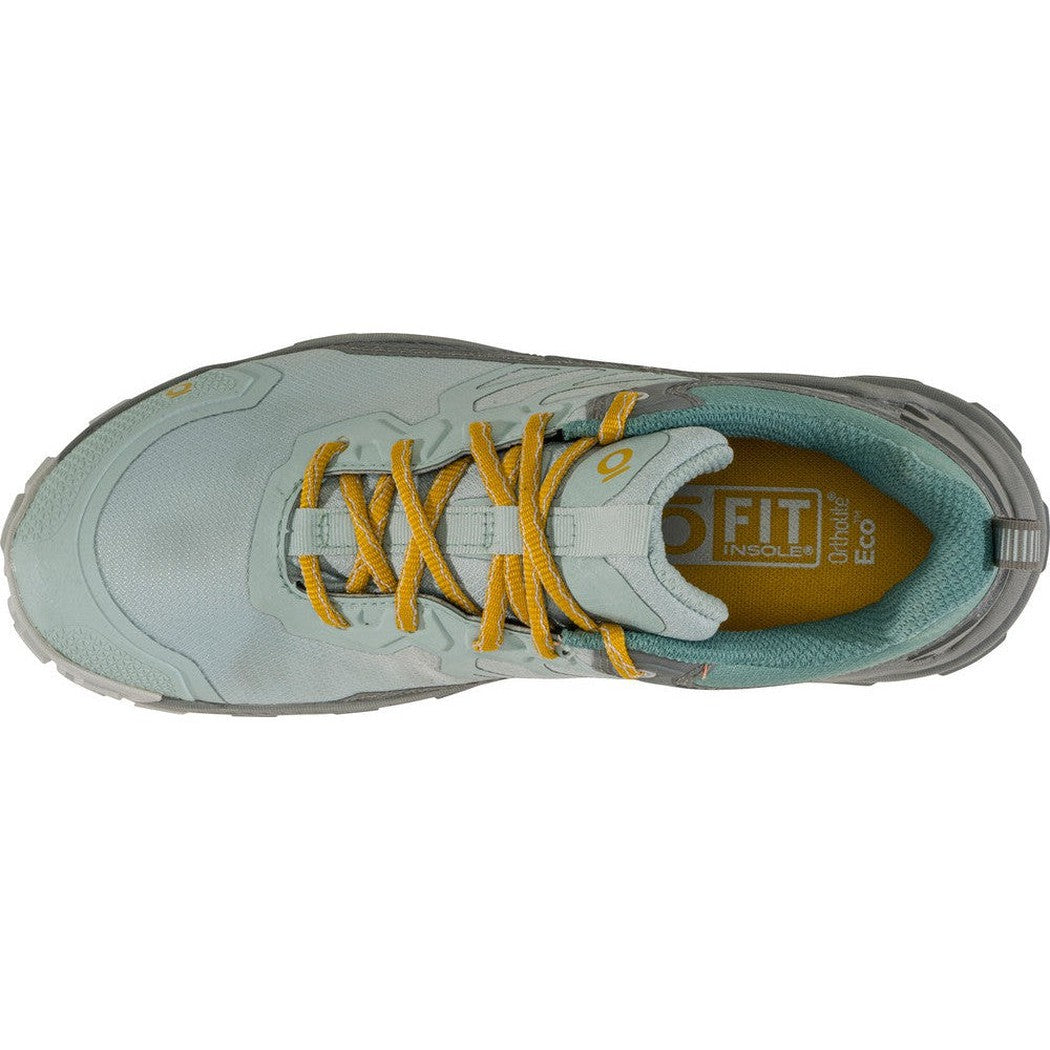 Top view of the Oboz Women's Katabatic Low B-DRY in Glacier showing yellow laces and a teal interior against a white background.