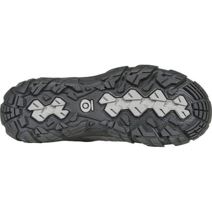 The sole of the Oboz Women's Sawtooth X Low B-Dry in Hazy Gray is shown from below, displaying the lugged tread pattern against a white background.