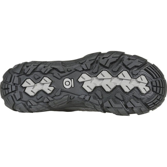 The sole of the Oboz Women's Sawtooth X Low B-Dry in Hazy Gray is shown from below, displaying the lugged tread pattern against a white background.