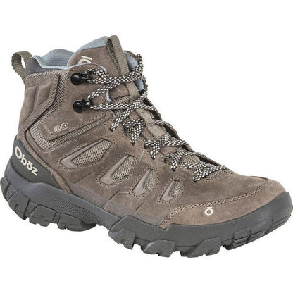 Side view of the Oboz Women's Sawtooth X Mid B-Dry in Rockfall showing the lugged outsole against a white background.