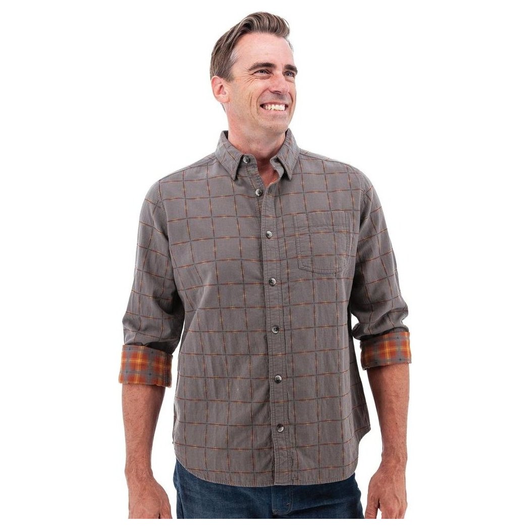 A front view of the Old Ranch Men's Chase Shirt 25 in Blue Skies showing the plaid cuffs and a smiling model against a white background.