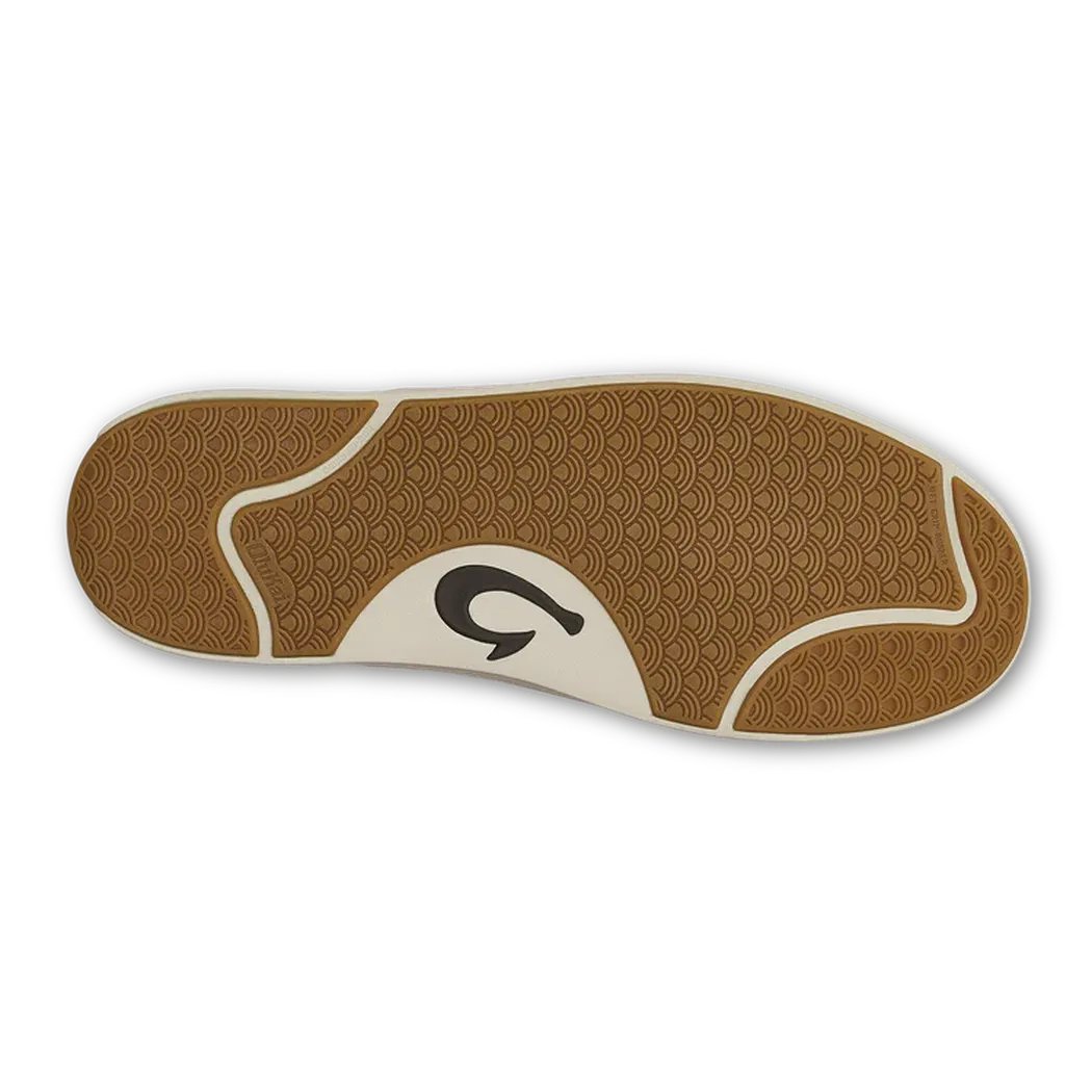 The sole of the Olukai Men's Lae'Ahi Lauhala shoe in Dark Java, showing the patterned tread and logo against a white background.
