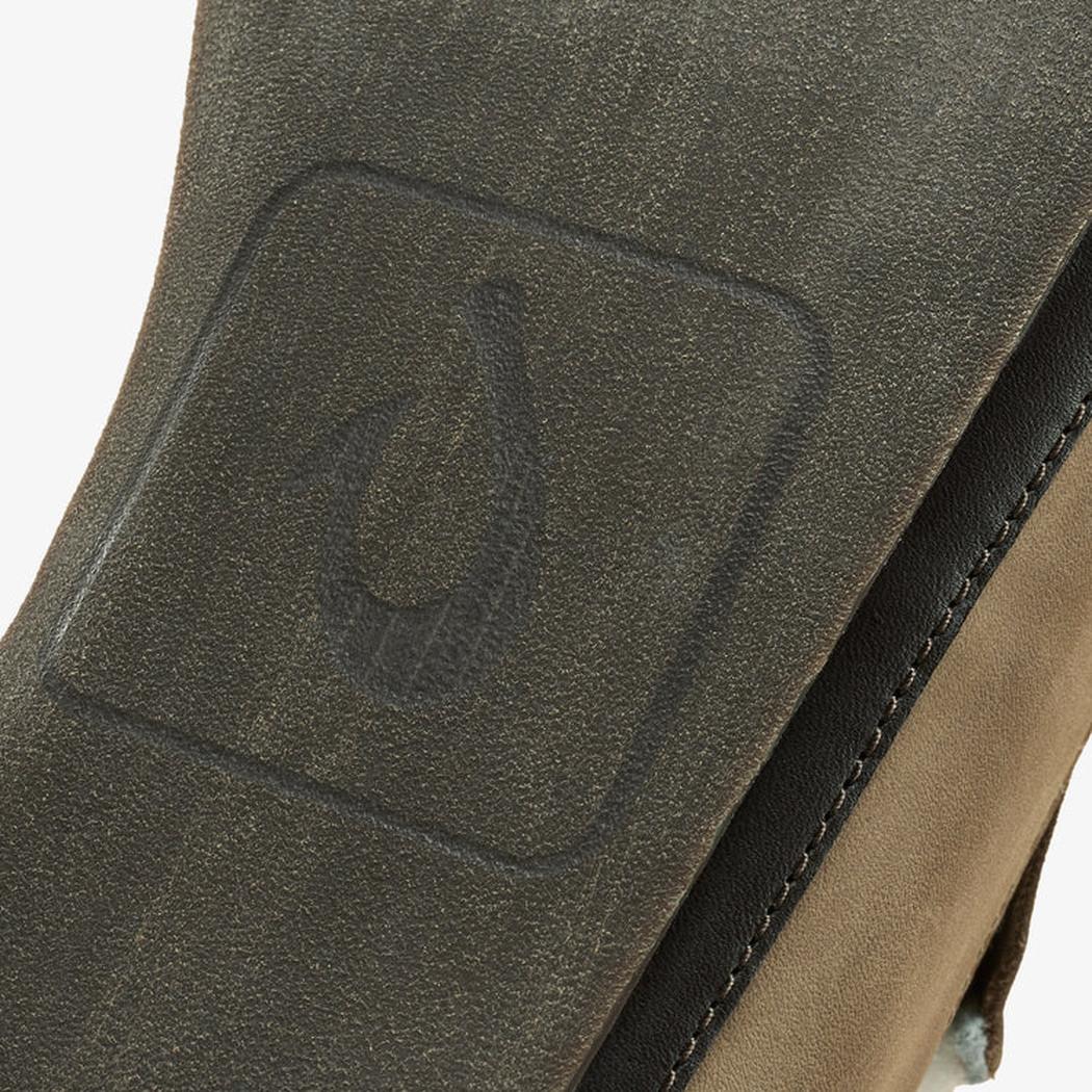 The close-up of the Olukai Men's Moloa Slipper in Clay/Dark Java shows the embossed logo on the heel against a neutral background.
