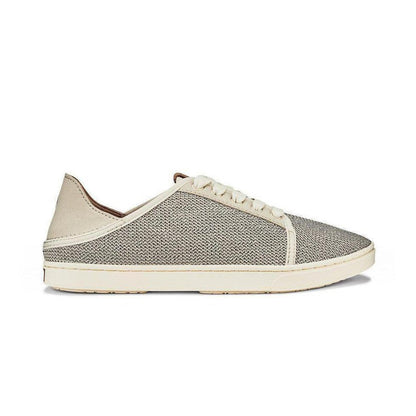 Side view of the Olukai Women's Pehuea Li in Tapa showing the mesh upper and white sole against a white background.