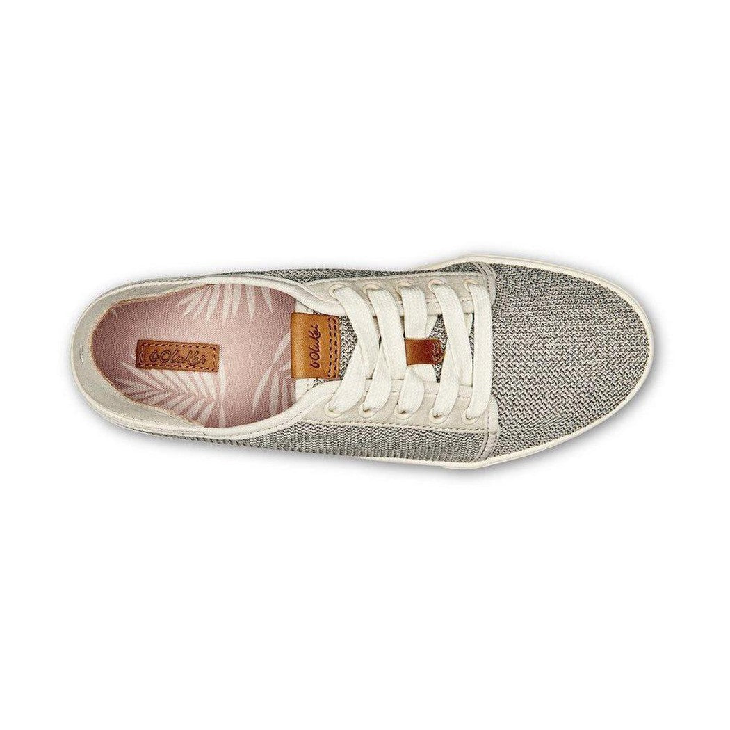 Top view of the Olukai Women's Pehuea Li in Tapa with white laces and a light pink interior against a white background.