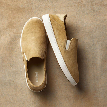 A top-down view of the Olukai Women's Pehuea Luxe in Toastd Coconut on a neutral background.