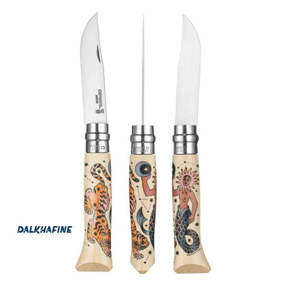 Three Opinel No.08 Artist Limited V Cosmos Edition knives with Dalkhafine handles, one with a tiger, one with a mermaid, and one with a sun god, displayed against a white background.