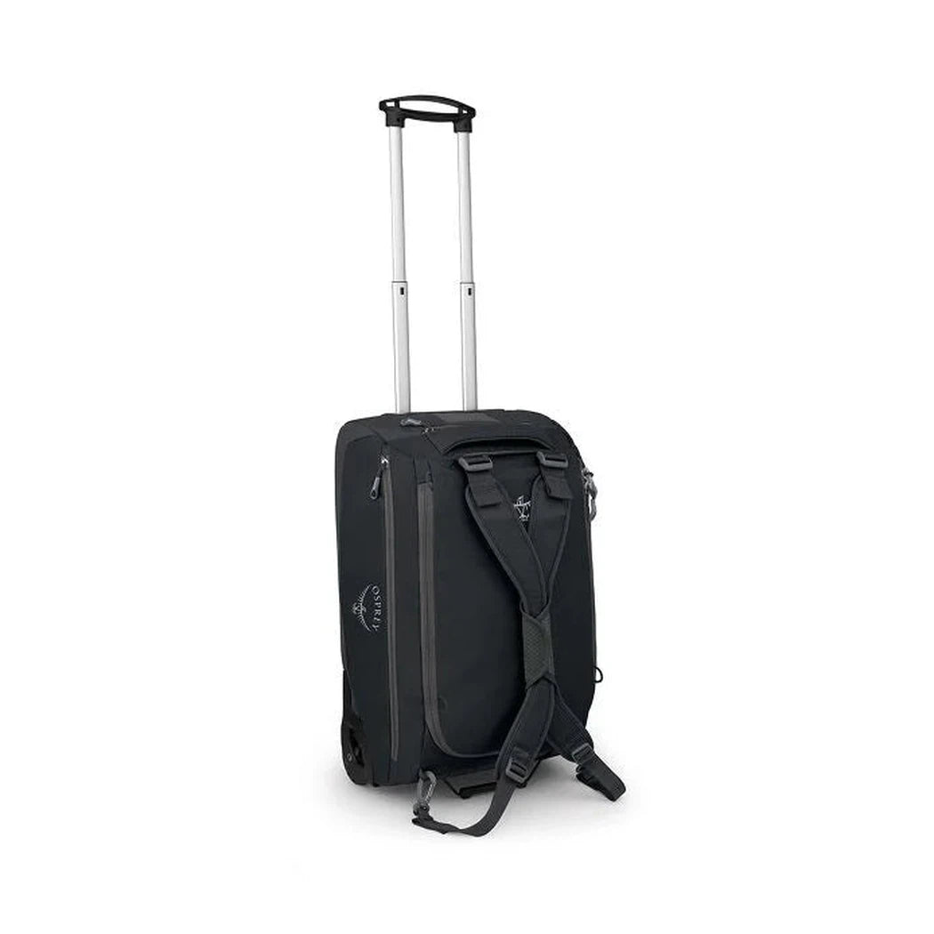 Back view of the Osprey Daylite Carry-On Wheeled Duffel 40 in Black with a telescoping handle and backpack straps against a white background.