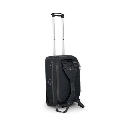 Back view of the Osprey Daylite Carry-On Wheeled Duffel 40 in Black with a telescoping handle and backpack straps against a white background.