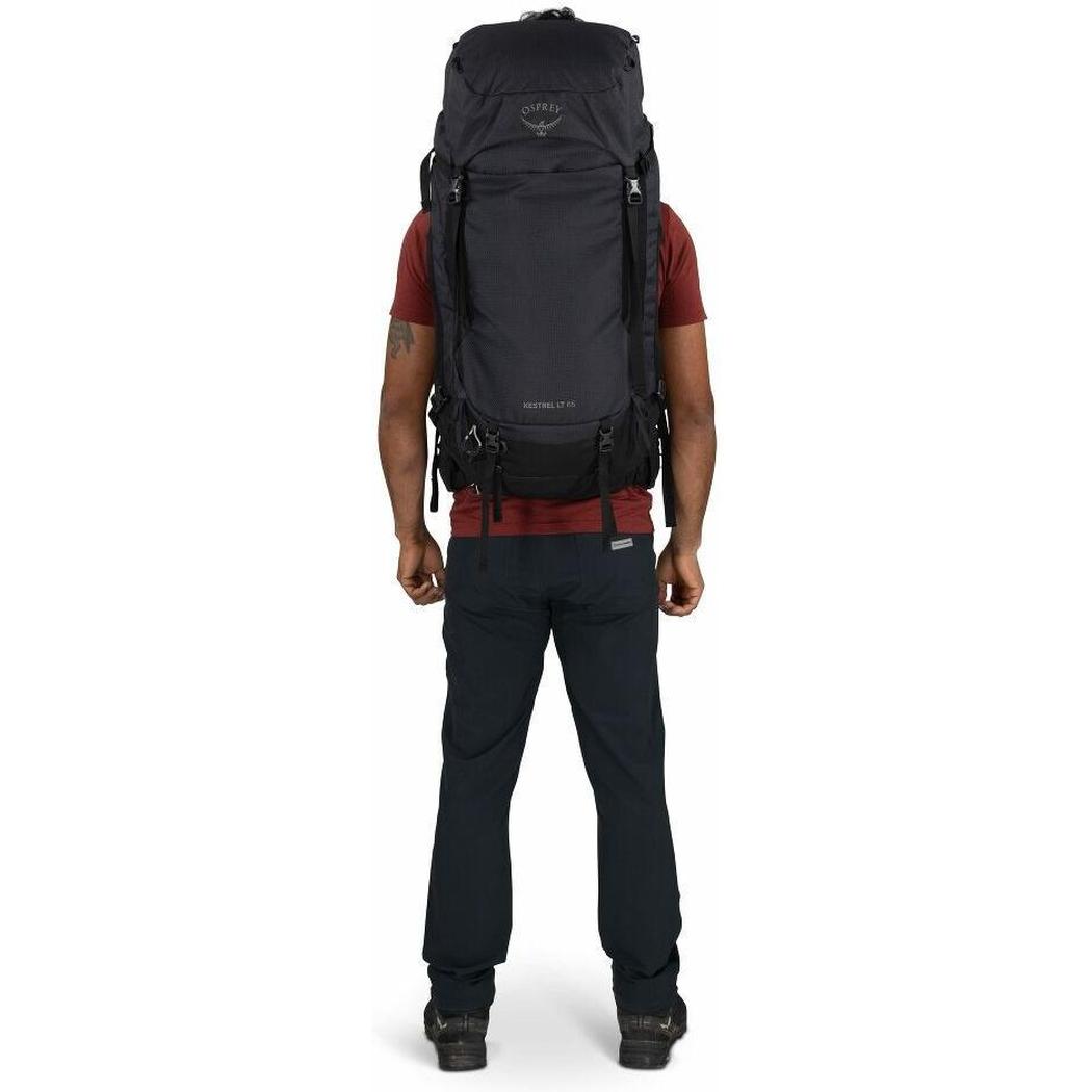 Back view of the Osprey Kestrel LT 65 backpack on a model wearing it against a white background.