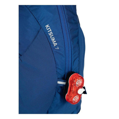 Side view of the Osprey Kitsuma 7 in SpaceTravelGrey showing the red rear light against a white background.