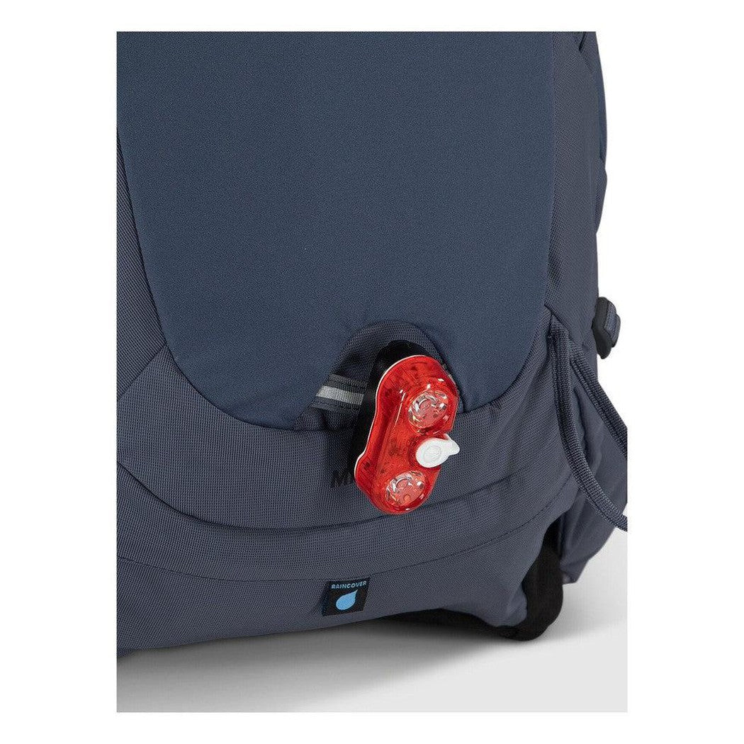 Side view of the Osprey Mira 32 in Anchor Blue showing the red light feature on the front pocket.