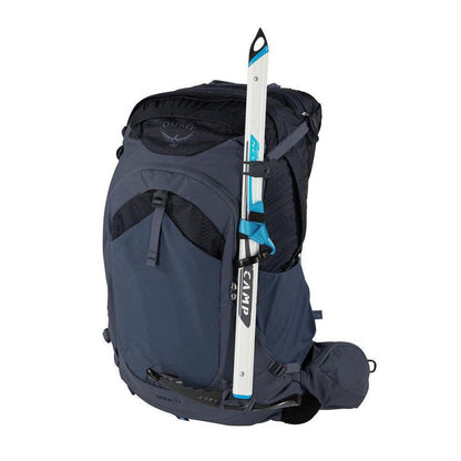 Side view of the Osprey Mira 32 in Anchor Blue showing the ski attachment on a white background.