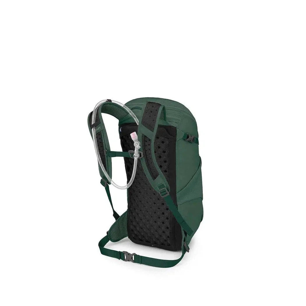 Side view of the Osprey Skarab 22 in Tundra Green showing the hydration tube and breathable back panel against a white background.