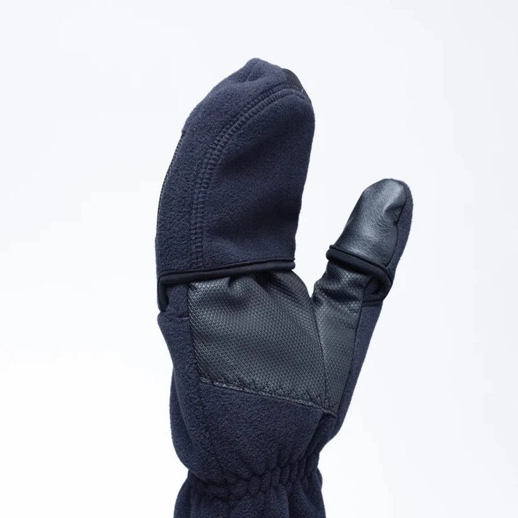 A close-up of the Outdoor Research Gripper Convertible Windbloc Mitts in Black, showing the black leather palm and a white background.