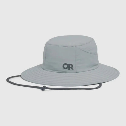 A front view of the Outdoor Research Helios Sun Hat in Light Pewter with a chin cord, against a plain white background.