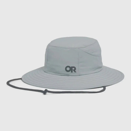 A front view of the Outdoor Research Helios Sun Hat in Light Pewter with a chin cord, against a plain white background.