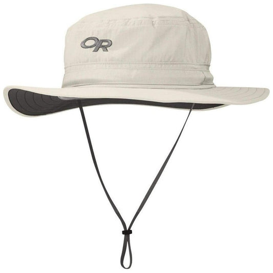 A front view of the Outdoor Research Helios Sun Hat in Sand showing the chin cord and wide brim against a white background.